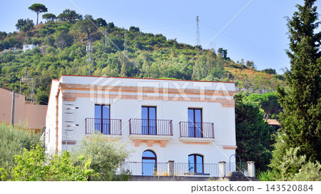Cefalu, Italy. 22 August 2026. Buildings situated on a hillside in a picturesque corner of Sicily. Cefalu, Italy. 22 August 2026. Buildings situated on a hillside in a picturesque corner of Sicily. 143520884