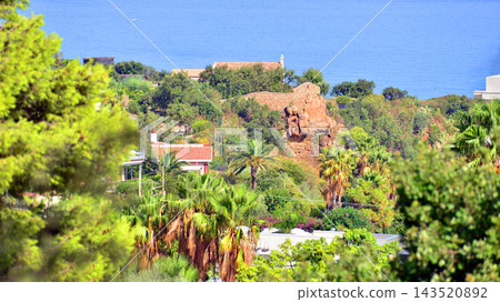 Cefalu, Italy. 22 August 2026. Buildings situated on a hillside in a picturesque corner of Sicily. 143520892