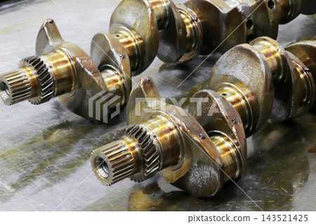 mechanical and engineering concept.. New engine crankshaft. mechanical and engineering concept.. New engine crankshaft. 143521425