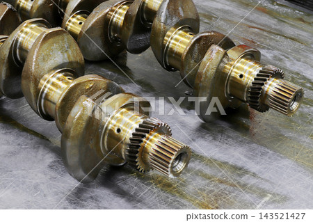mechanical and engineering concept.. New engine crankshaft. mechanical and engineering concept.. New engine crankshaft. 143521427