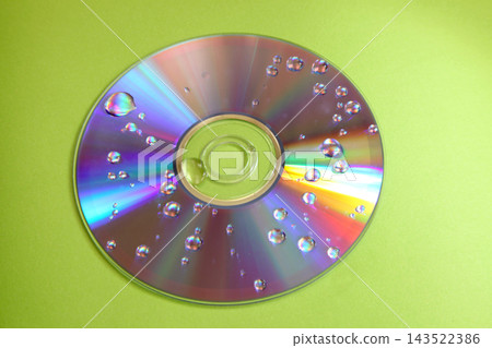 Water drops on a cd. Water drops on a cd. 143522386