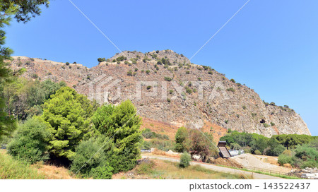 Cefalu, Italy. 22 August 2026. Cliff La Rocca in northern Sicily. Cefalu, Italy. 22 August 2026. Cliff La Rocca in northern Sicily. 143522437