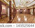 Grand Luxury Ballroom Interior With Ornate Gold Detailing, Marble Columns and Crystal Chandeliers in a Palace Hall 143525644