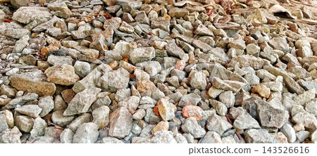 Close-up photo of the texture of a pile of gravel on the ground Close-up photo of the texture of a pile of gravel on the ground 143526616