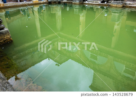 The Roman Baths, surrounded by honey-colored stone buildings, in Bath, a UNESCO World Heritage site in the UK. The Roman Baths, surrounded by honey-colored stone buildings, in Bath, a UNESCO World Heritage site in the UK. 143528679