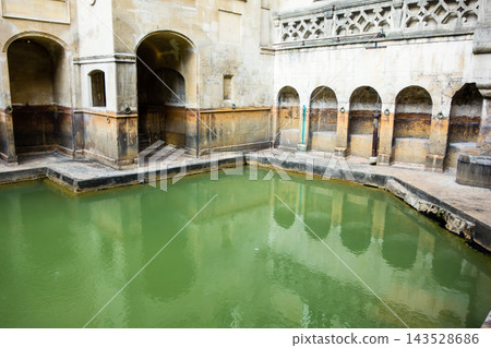 The Roman Baths, surrounded by honey-colored stone buildings, in Bath, a UNESCO World Heritage site in the UK. The Roman Baths, surrounded by honey-colored stone buildings, in Bath, a UNESCO World Heritage site in the UK. 143528686