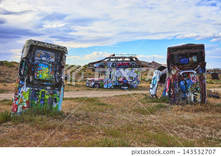 Graffiti Covered Abandoned Vehicles in International Car Forest Nevada Desert Graffiti Covered Abandoned Vehicles in International Car Forest Nevada Desert 143532707