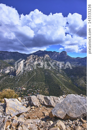 Cathedral Rock Summit View with Mt Charleston Peaks and Dramatic Clouds Nevada Cathedral Rock Summit View with Mt Charleston Peaks and Dramatic Clouds Nevada 143533236