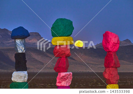 Seven Magic Mountains Art Installation Full Moon and Blue Hour Desert Landscape Seven Magic Mountains Art Installation Full Moon and Blue Hour Desert Landscape 143533398