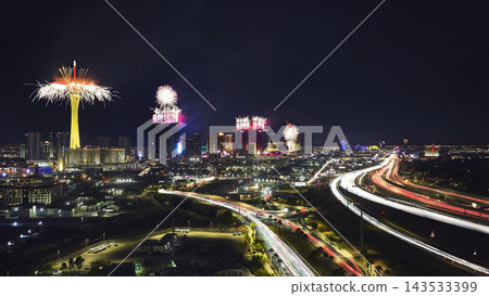 Aerial Las Vegas Strip Fireworks and Car Trails at Night United States 143533399