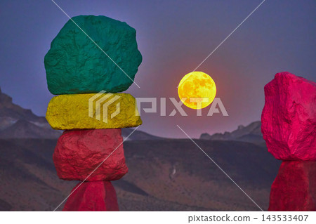 Seven Magic Mountains Full Strawberry Moon and Colorful Rocks Near Las Vegas Nevada Seven Magic Mountains Full Strawberry Moon and Colorful Rocks Near Las Vegas Nevada 143533407