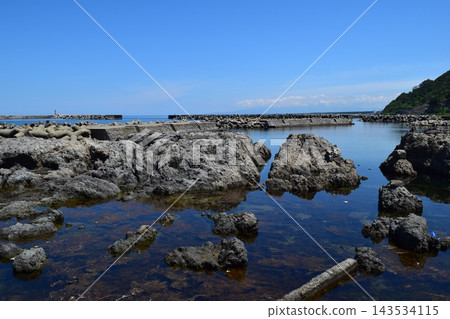 The rocky landscape of the Shonai coast where rocky shores of strangely shaped rocks continue The rocky landscape of the Shonai coast where rocky shores of strangely shaped rocks continue 143534115