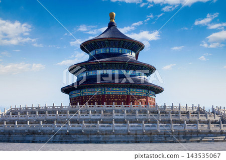The Hall of Prayer for Good Harvests at the Temple of Heaven in Beijing, China, under a clear blue sky with scattered clouds. The Hall of Prayer for Good Harvests at the Temple of Heaven in Beijing, China, under a clear blue sky with scattered clouds. 143535067