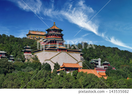 Traditional Chinese Pagoda and Temple Complex on a Lush Green Hillside in Beijing Traditional Chinese Pagoda and Temple Complex on a Lush Green Hillside in Beijing 143535082