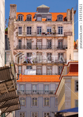 Historic Residential Buildings with Balconies and Red Tiled Roofs in Lisbon, Portugal Historic Residential Buildings with Balconies and Red Tiled Roofs in Lisbon, Portugal 143535821