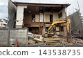 Old wooden house being demolished 143538735