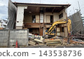 Old wooden house being demolished 143538736