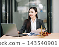 Beautiful asian woman lawyer working and gavel, tablet, laptop in front, Advice justice Beautiful asian woman lawyer working and gavel, tablet, laptop in front, Advice justice 143540901