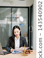 Beautiful asian woman lawyer working and gavel, tablet, laptop in front, Advice justice Beautiful asian woman lawyer working and gavel, tablet, laptop in front, Advice justice 143540902