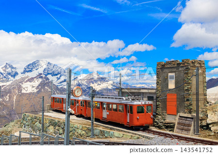 Beautiful view of the Swiss Alps with cogwheel train of Gornergrat railway close to Zermatt, Switzerland Beautiful view of the Swiss Alps with cogwheel train of Gornergrat railway close to Zermatt, Switzerland 143541752