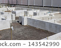 Residential building foundation work: concrete foundations and anchor bolts 143542990