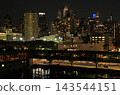 Views of Manhattan's skyscrapers and the harbor from a ship. 143544151