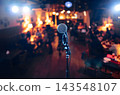 Microphone on Stage in a Cozy Nightclub. 143548107