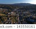 An aerial photograph capturing the hot spring town and mountain range of Tamatsukuri Onsen in Matsue City, Shimane Prefecture. 143550161