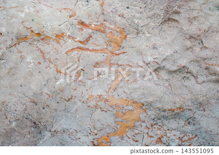 Natural rock texture old stone. Natural beige marble stone texture with cracked details Natural rock texture old stone. Natural beige marble stone texture with cracked details 143551095