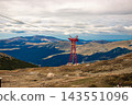 overhead cable car on mountain road against sky. View of Carpathians overlooking with mountain 143551096