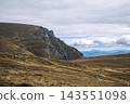 Rocky mountains view, carpathian's mountain autumn meadow on a background of blue sky 143551098