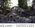 Ancient cannon on cobblestone ground in a historical courtyard, Weapons of the 18th century 143551103