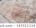 Natural beige marble stone texture with cracked weathered details backdrop 143551118