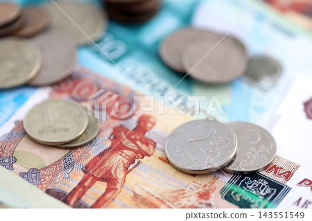 Coins and banknotes of Russian Federation ruble currency. Russia RUB money close up. Business Coins and banknotes of Russian Federation ruble currency. Russia RUB money close up. Business 143551549