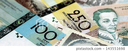 Haitian gourde money bills pile on table. Haiti banknotes of HTG currency. Concept of business 143551698