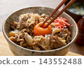 Beef bowl (Gyudon) - A popular Japanese rice bowl dish, topped with an egg. 143552488