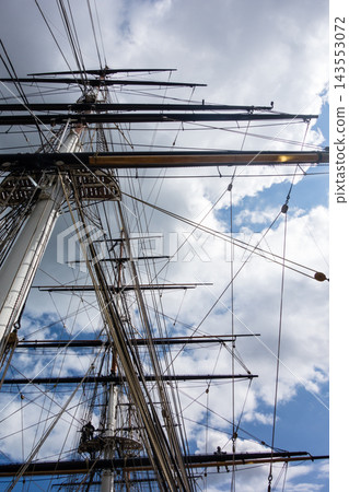The mast of the historic sailing ship Cutty Sark in Greenwich, East London, under the bright sunlight. 143553072