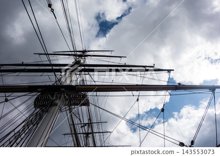The mast of the historic sailing ship Cutty Sark in Greenwich, East London, under the bright sunlight. The mast of the historic sailing ship Cutty Sark in Greenwich, East London, under the bright sunlight. 143553073