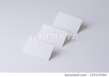 White background and three white cards White background and three white cards 143553084