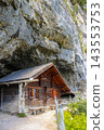 The historic wooden hermit house built into a mountain cave cliff in the Alpstein region, Appenzell, Switzerland 143553753