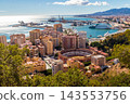 Aerial Scenic View of Malaga Cityscape with La Malagueta Bullring, Houses and Mediterranean Sea, Spain 143553756