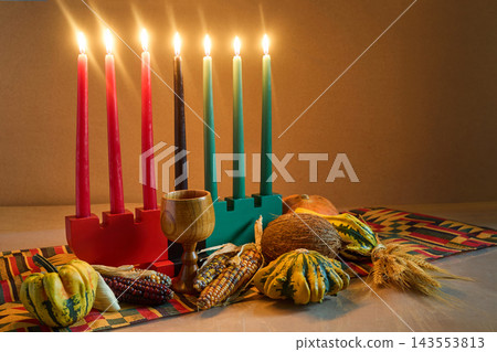 Kwanzaa kinara with seven burning mishumaa saba candles 143553813