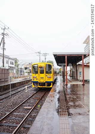 A train stopping at Shimabara Port Station, the terminal station of the Shimabara Railway. A train stopping at Shimabara Port Station, the terminal station of the Shimabara Railway. 143554017