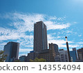 High-rise apartment complex against the blue sky 143554094