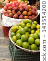 Red apples and green oranges sold in a market in Kathmandu, Nepal 143554200