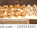 Ginger and garlic sold in a market in Kathmandu, Nepal 143554201