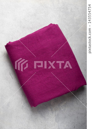 Folded Fuchsia Pink Linen Tablecloth Flat Lay Folded Fuchsia Pink Linen Tablecloth Flat Lay 143554754