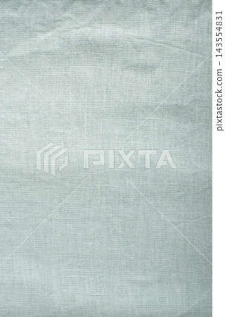 Top view macro photograph of washed natural linen fabric in light mint green Top view macro photograph of washed natural linen fabric in light mint green 143554831
