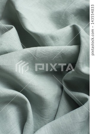 Draped Mint Green Linen Fabric Macro Texture Close Up Draped Mint Green Linen Fabric Macro Texture Close Up 143554833