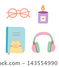 A cute study arrangement featuring a cozy candle and a cat notebook alongside a modern headphone and eyeglass. 143554990
